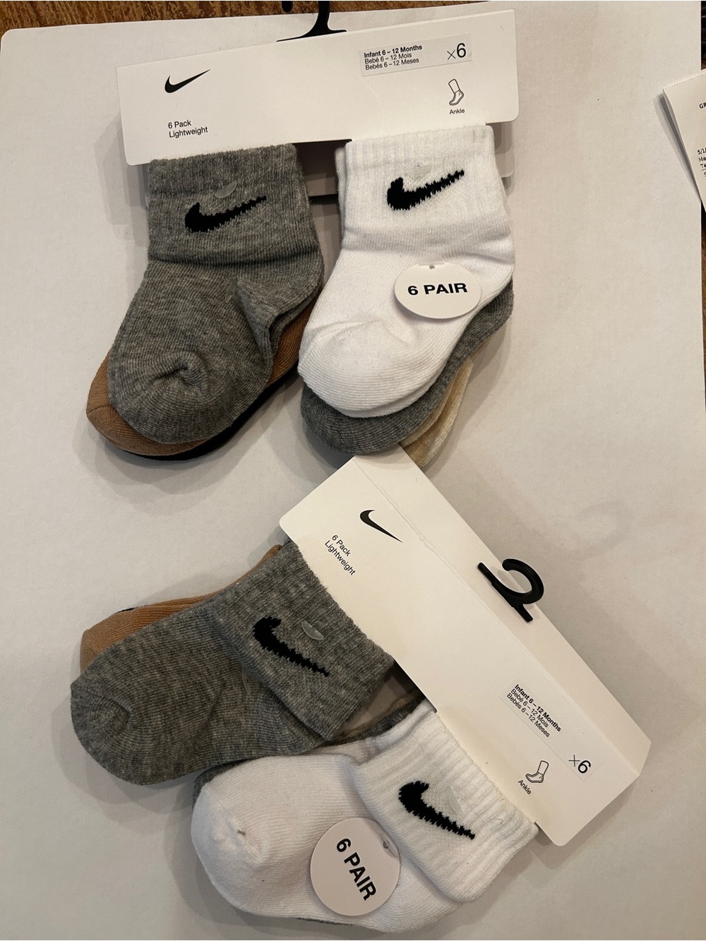 Nike 2 assorted 6 pack pair of socks. 6M-12M